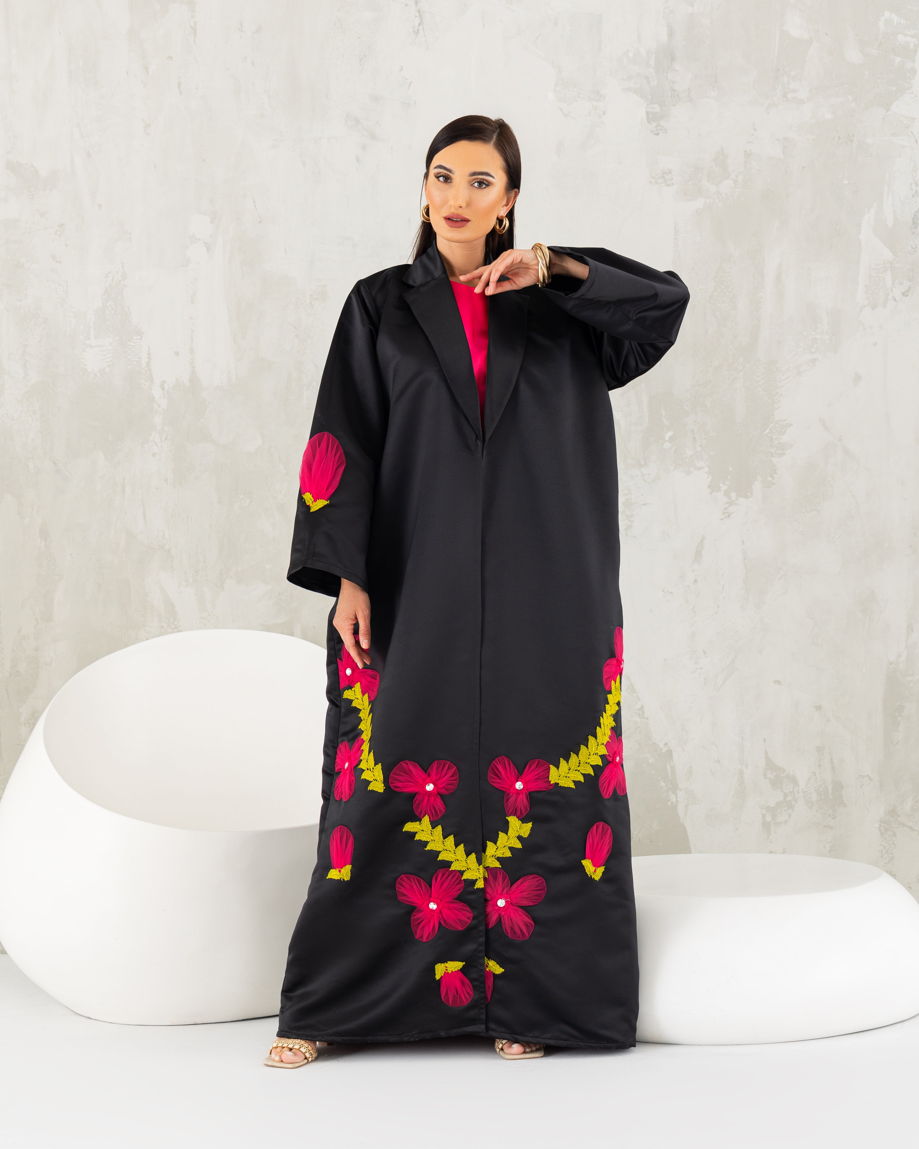 Tuxedo abaya with tulle petals.