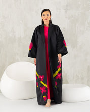 Tuxedo abaya with tulle petals.