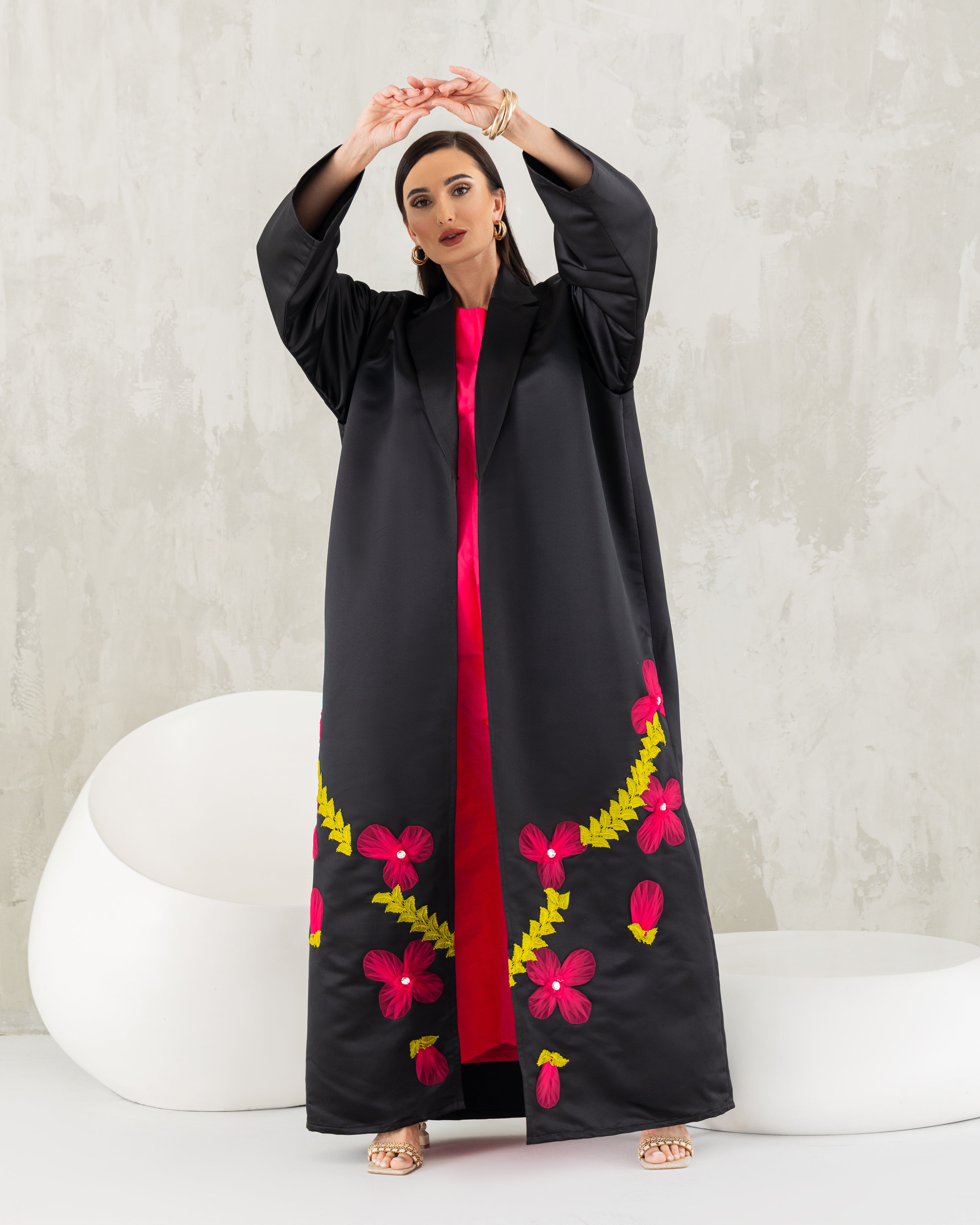 Tuxedo abaya with tulle petals.