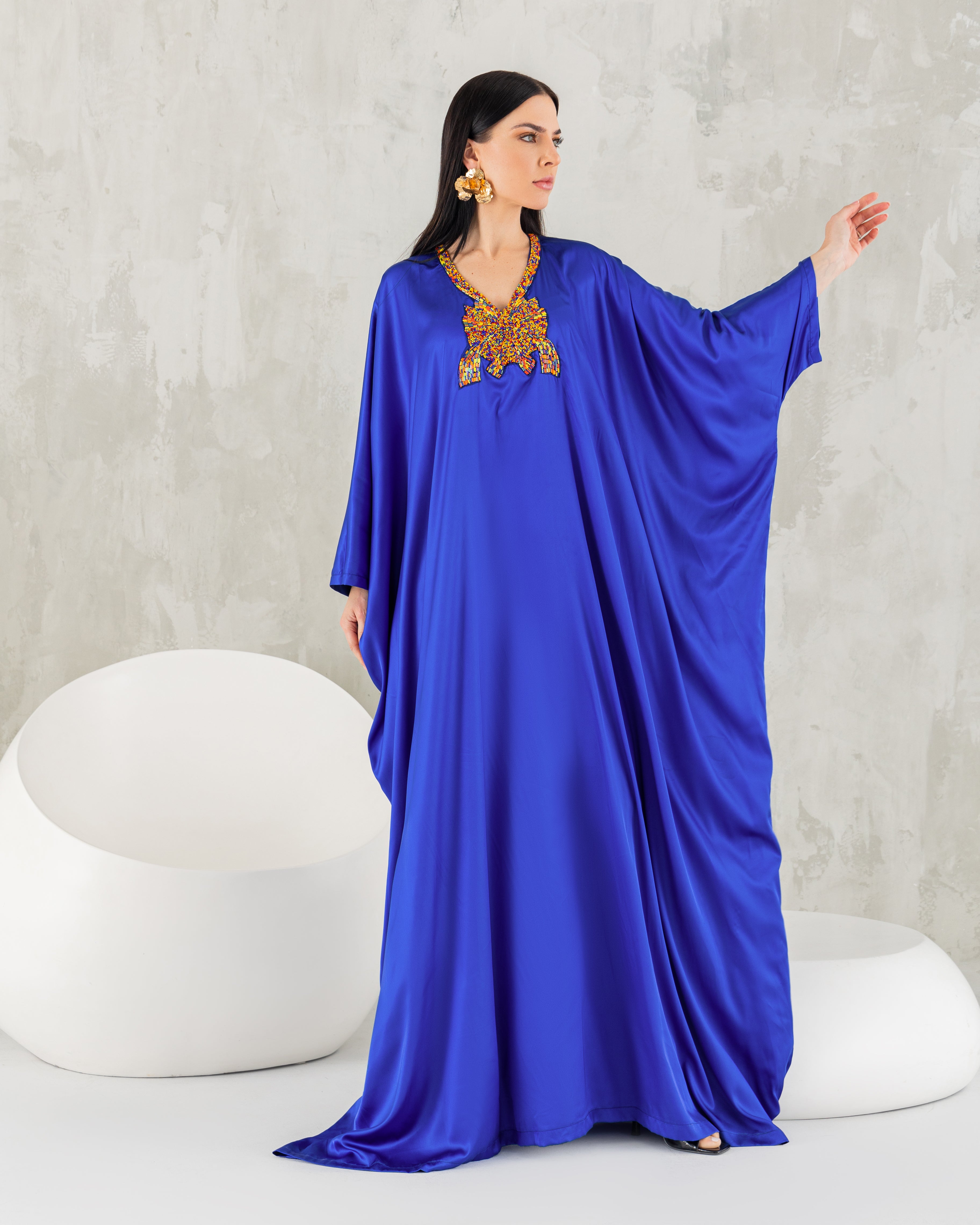 Multicolored beaded neckline kaftan.