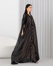 Sheer abaya with vintage buttons.